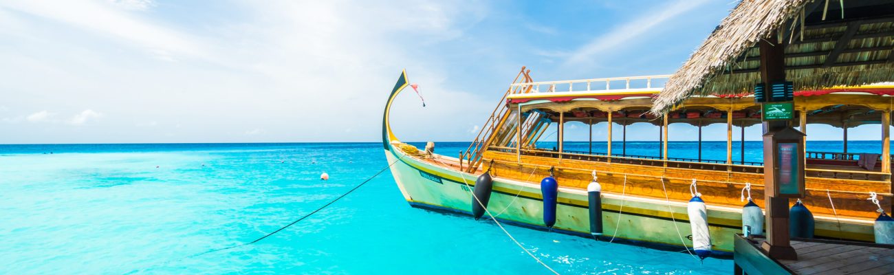 Beautiful tropical Maldives resort hotel and island with beach and sea on sky for holiday vacation background concept - Boost up color Processing